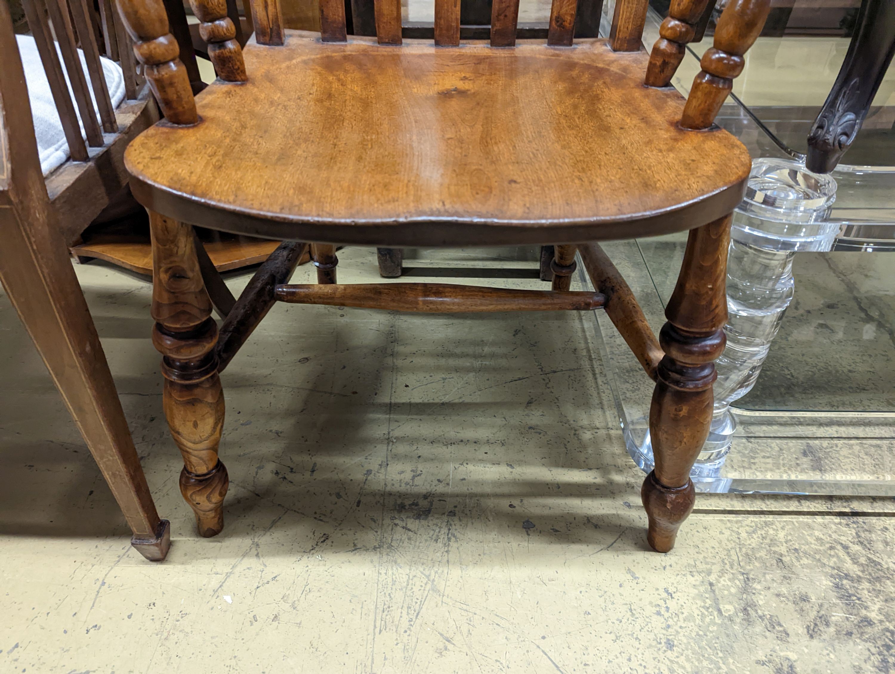 A Victorian elm and beech Windsor lathe back armchair, width 57cm, depth 45cm, height 118cm